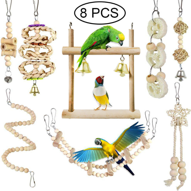 Set of bird toys with a parrot perched on a wooden stand, surrounded by hanging toys.