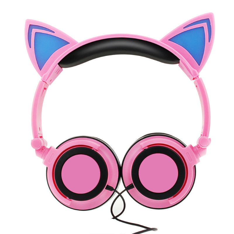 Pink headphones with cat ears on a white background