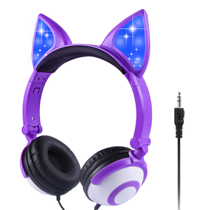 Purple headphones with cat ear design and blue LED lights on a white background