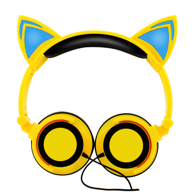 Yellow headphones with cat ears on a white background