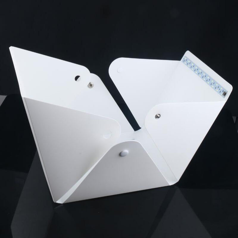 White geometric object on a black background