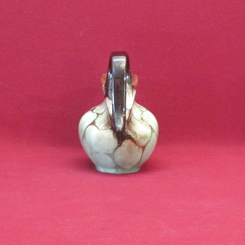 Timeless Beauty Exploring Collectible Handmade Creamers and Vintage Pottery