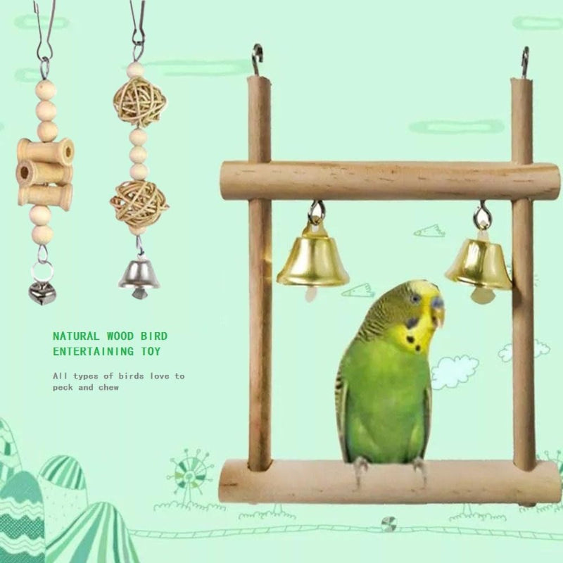 Bird toy with wooden bars and hanging beads on a light green background