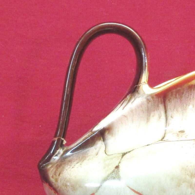 Timeless Beauty Exploring Collectible Handmade Creamers and Vintage Pottery