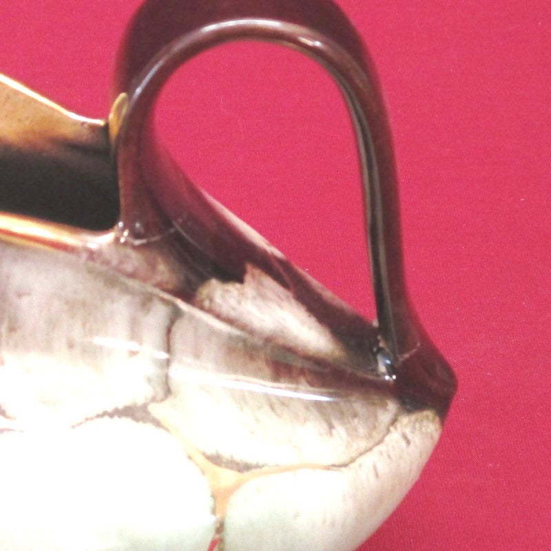 Timeless Beauty Exploring Collectible Handmade Creamers and Vintage Pottery