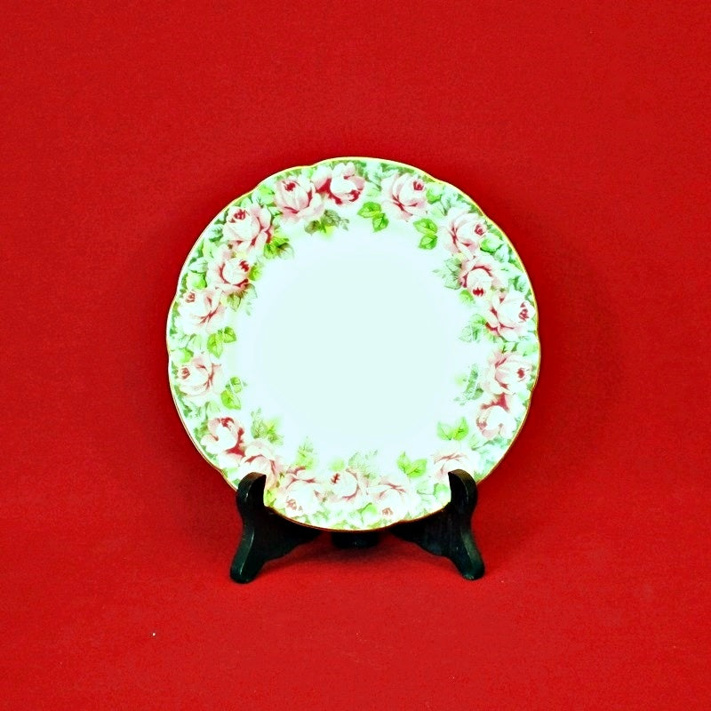 #collectible plates #floral design #porcelainart #finechina #craftsmanship #handpainted #redroses #scallopededge #goldtrim #stampedrosepattern #mintcondition #handpainted #redroses #vintageplates #scallopededge #goldtrim #collectiblechina #japaneseporcelain #antiquedinnerware #handcrafted #uniquedesign #vintagekitchenware #rosepattern #japanmade #finechina #decorativeplates #classicdinnerware