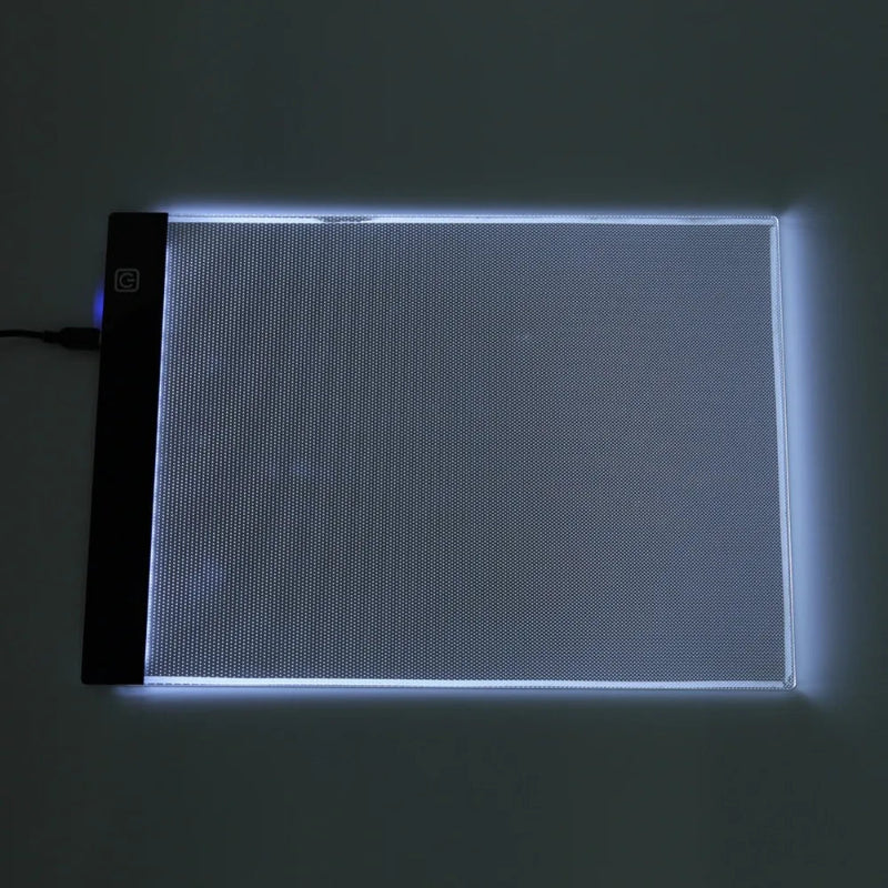 Light pad with grid pattern on a dark background