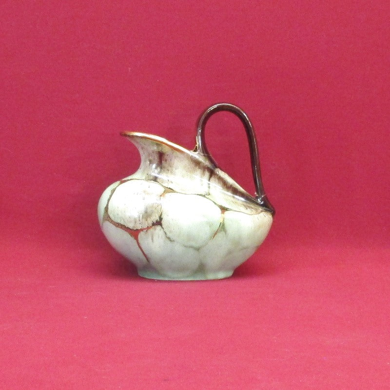 Timeless Beauty Exploring Collectible Handmade Creamers and Vintage Pottery