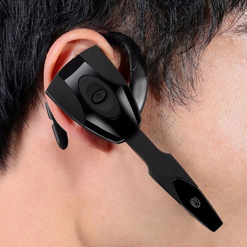 Black wireless earbud in use with a person wearing it.