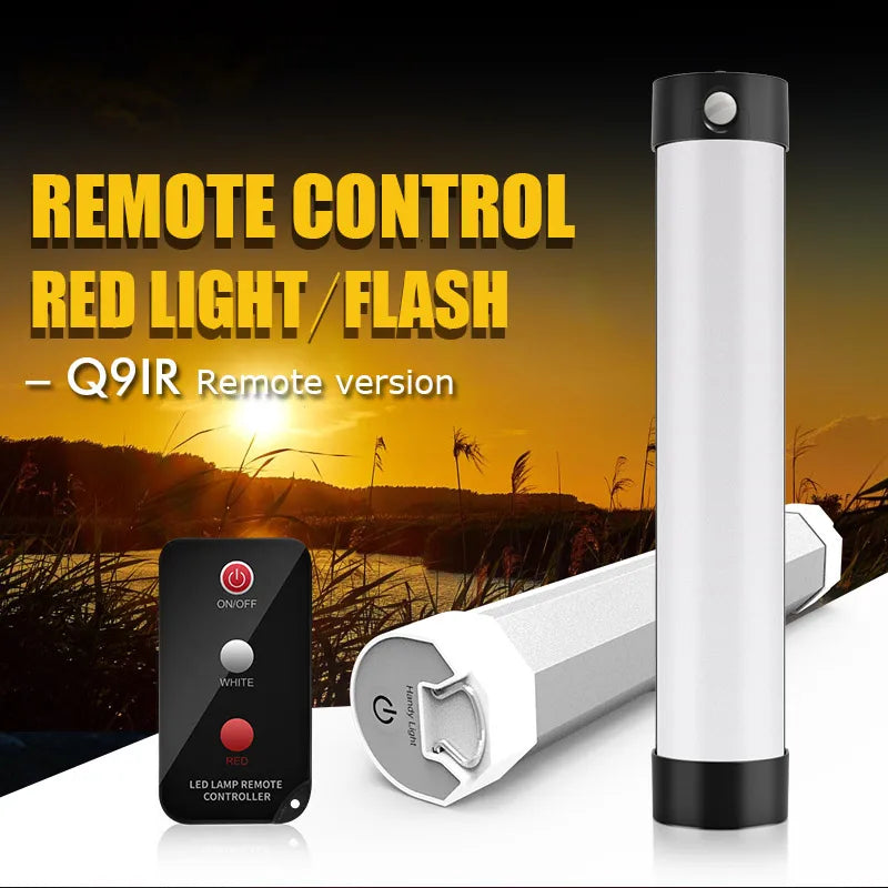 A portable LED light with a remote control, labeled as 'Q9IR Remote Control Red Light Flash' with a sunset background. The light appears to be a cylinder with a cap on one end and a base that contains the control buttons.