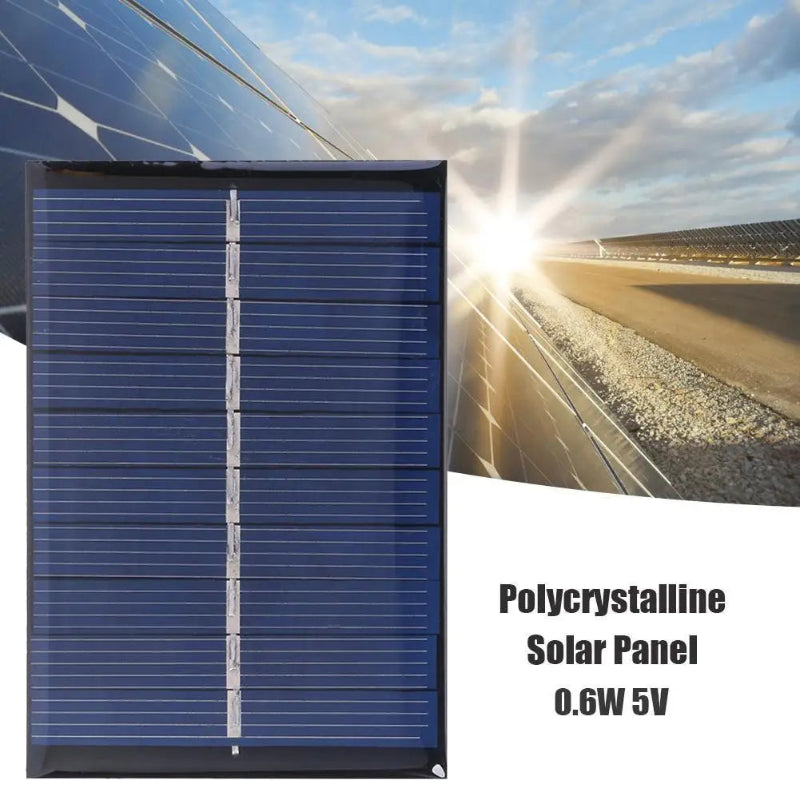 Polycrystalline solar panel with a road and sun in the background