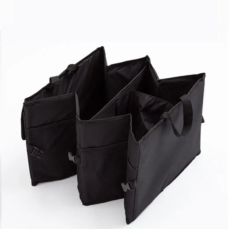 Black car organizer with multiple compartments on a white background