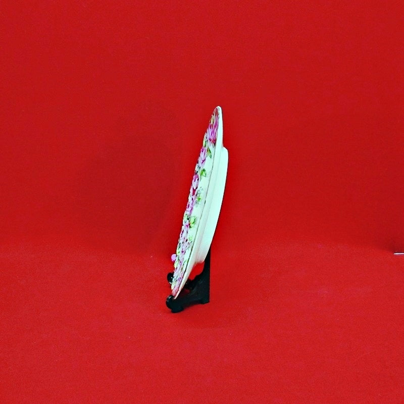 #collectible plates #floral design #porcelainart #finechina #craftsmanship #handpainted #redroses #scallopededge #goldtrim #stampedrosepattern #mintcondition #handpainted #redroses #vintageplates #scallopededge #goldtrim #collectiblechina #japaneseporcelain #antiquedinnerware #handcrafted #uniquedesign #vintagekitchenware #rosepattern #japanmade #finechina #decorativeplates #classicdinnerware