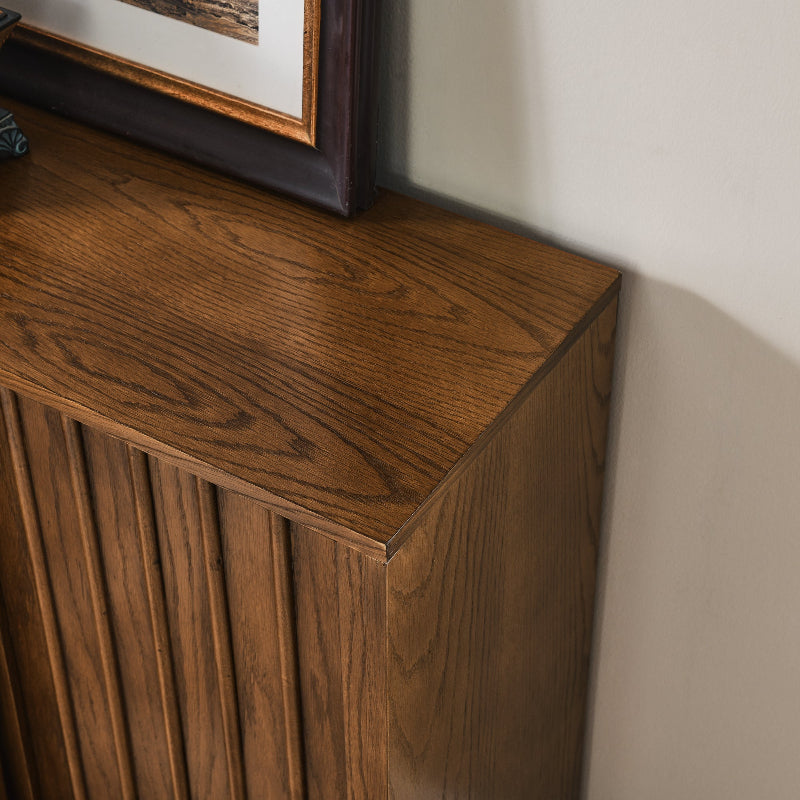 Wooden surface with a framed picture in the corner