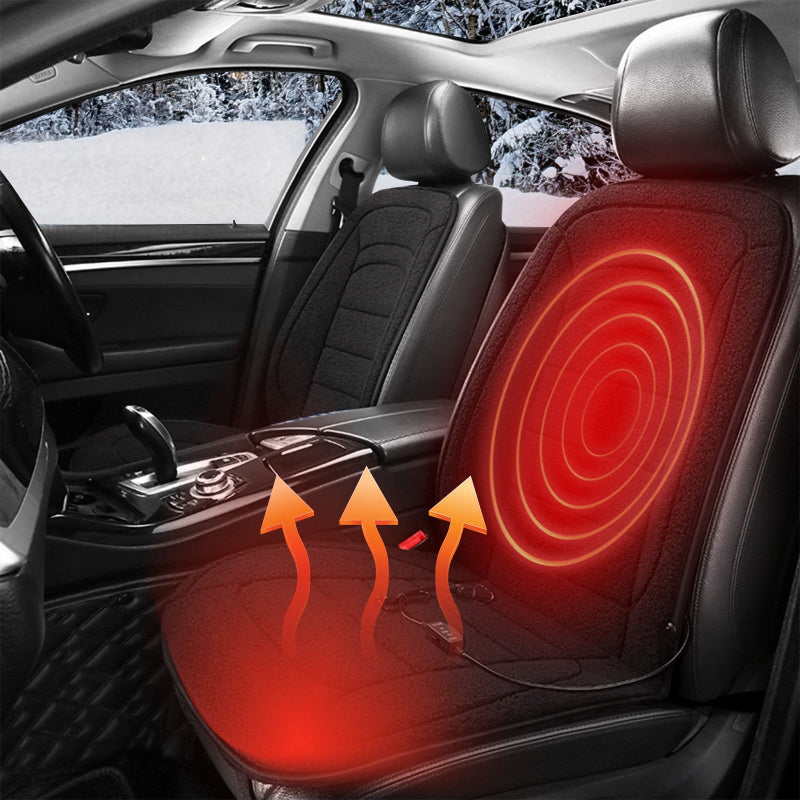 Car seat with a heated pad showing heating arrows, set against a snowy outdoor background.