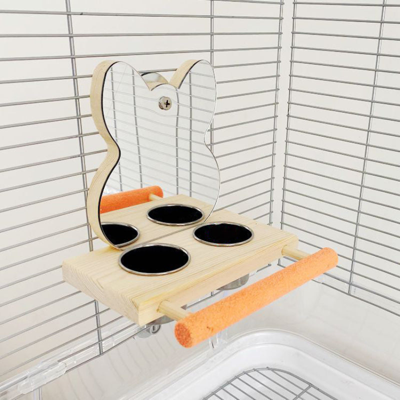Wooden bird perch with black perches and orange accents mounted on a wire cage.