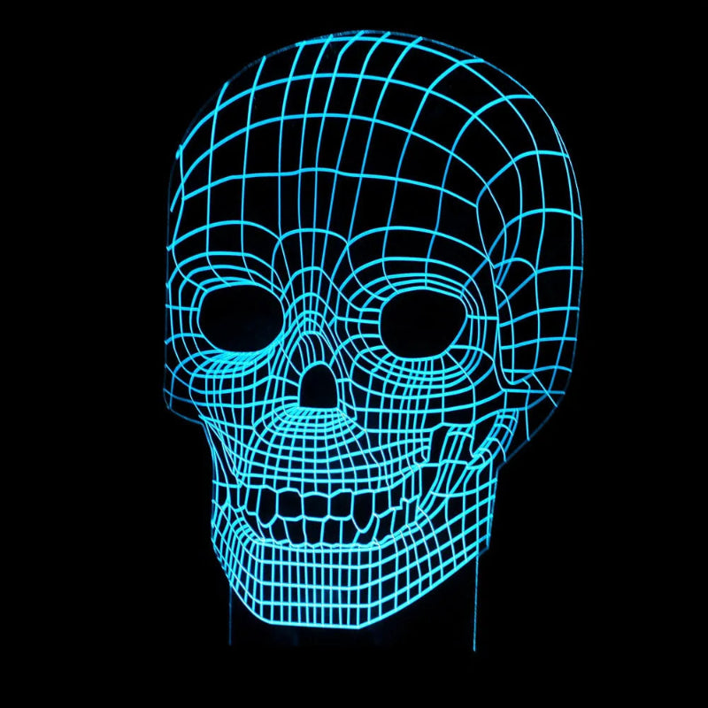 A glowing skull-shaped LED night light with a cyan wireframe design on a solid black background.
