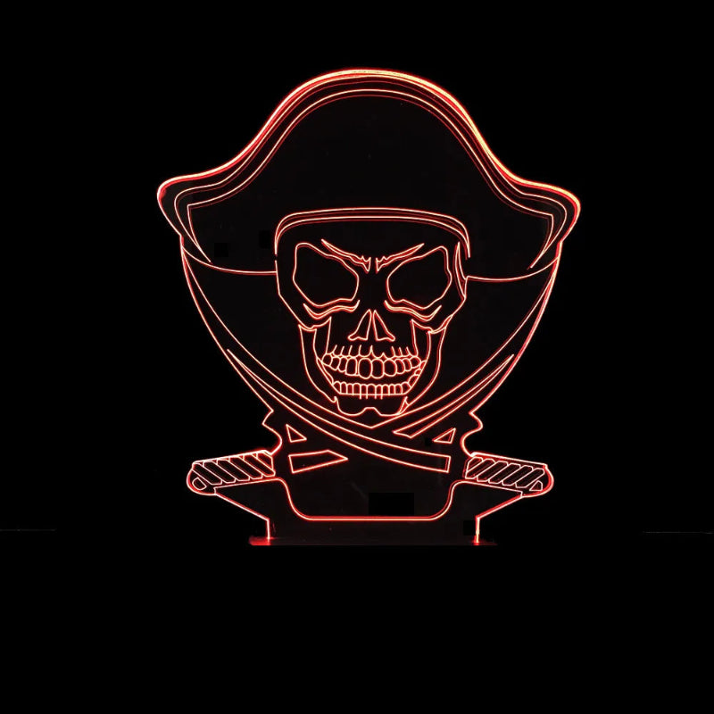 A pirate skull LED night light glowing in red-orange light against a solid black background.
