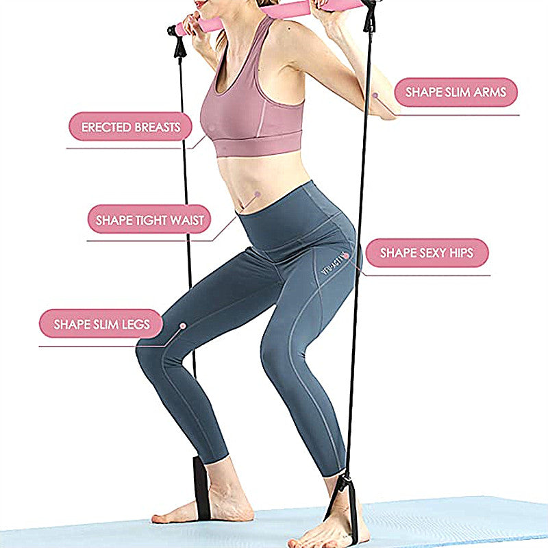 Woman exercising with resistance bands on a white background
