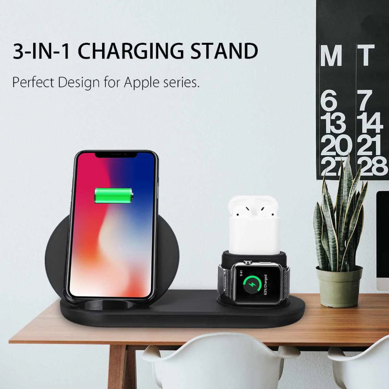 3-in-1 charging stand with smartphone, airpods, and smartwatch on a table with a plant and calendar in the background.