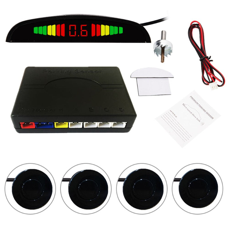 Car parking sensor kit with display, sensors, and cable on a white background