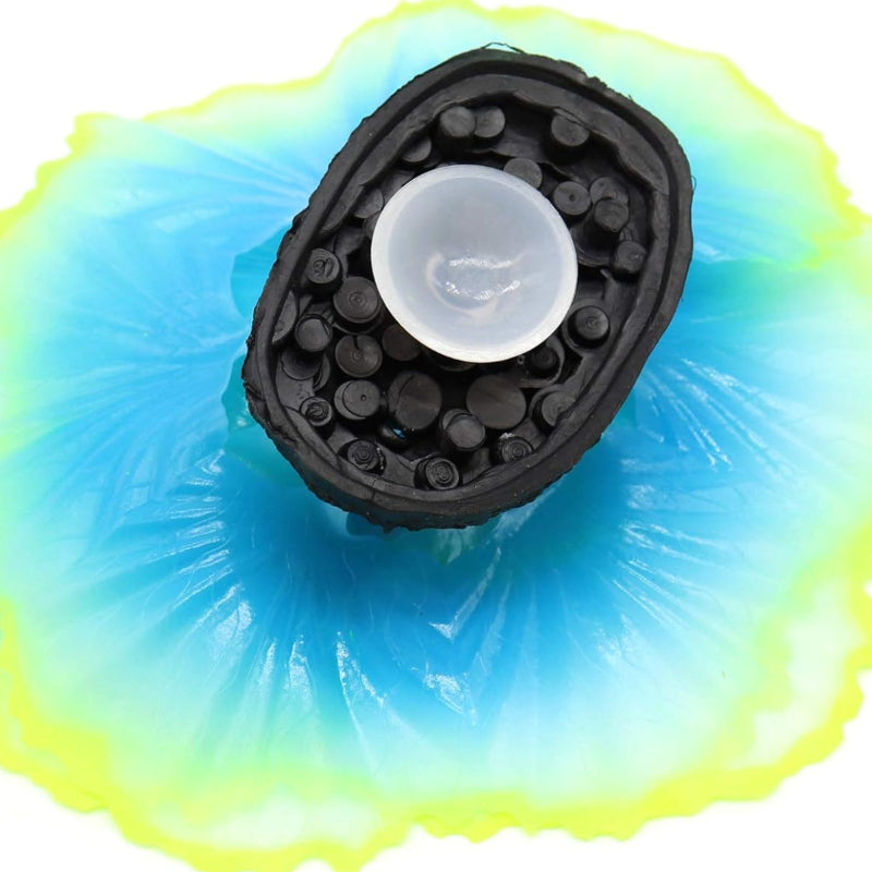 Colorful silicone pet toy with black center on a white background