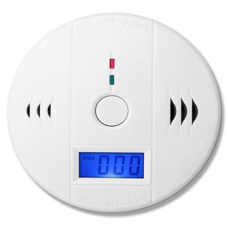White smoke detector with digital display on a white background