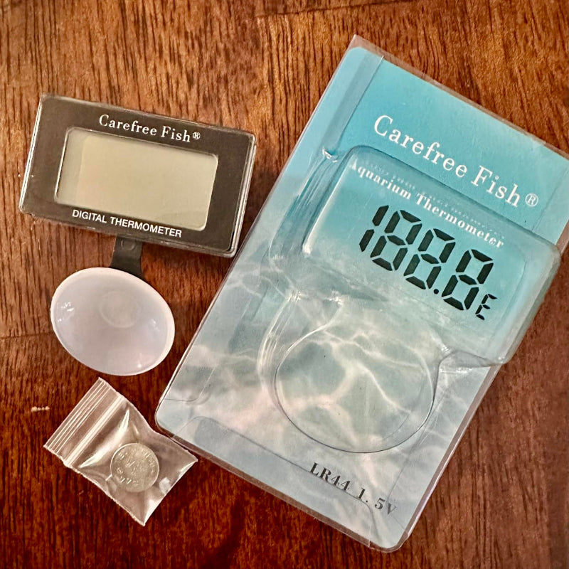 Digital thermometer for aquariums on a wooden surface