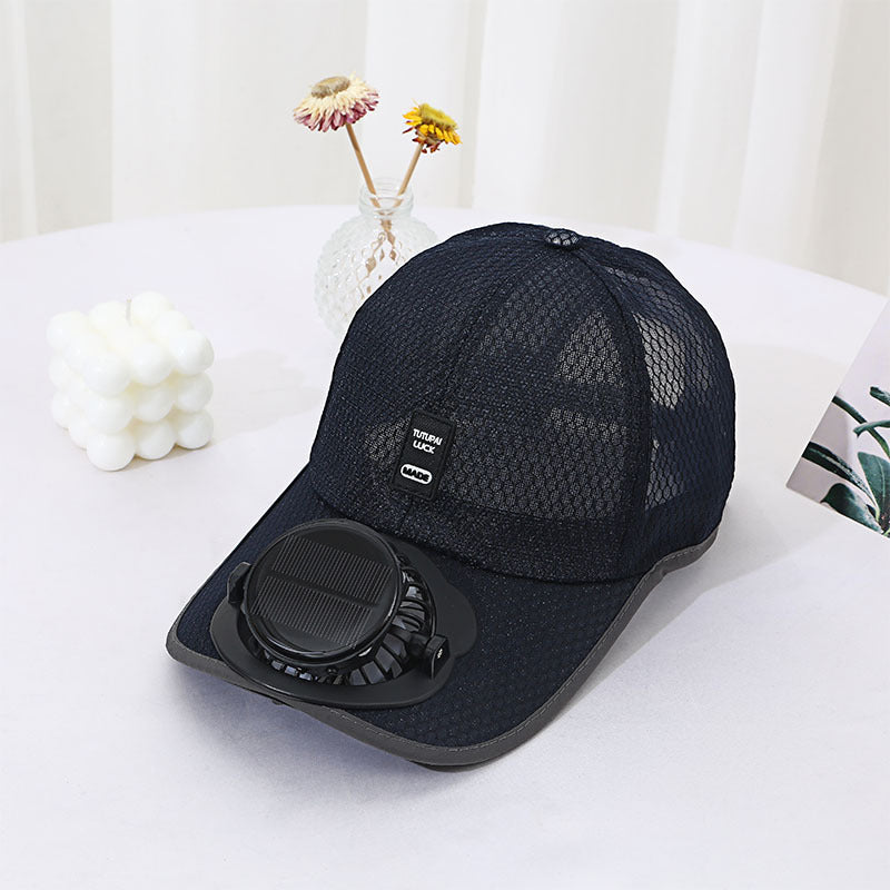 Black baseball cap with a fan on a white surface