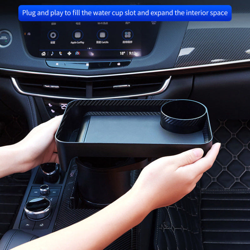 Car cup holder expansion tray being installed in a vehicle, with text about one-second installation.