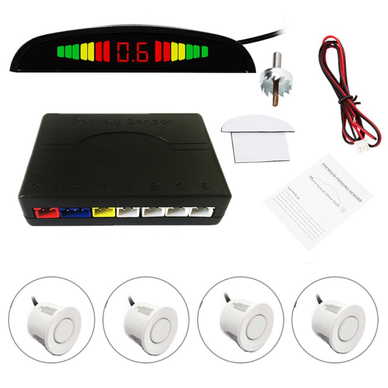 Car parking sensor system with display, receiver, sensors, and cable on a white background