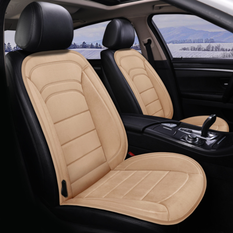 Car interior with beige seat covers and a scenic view outside.