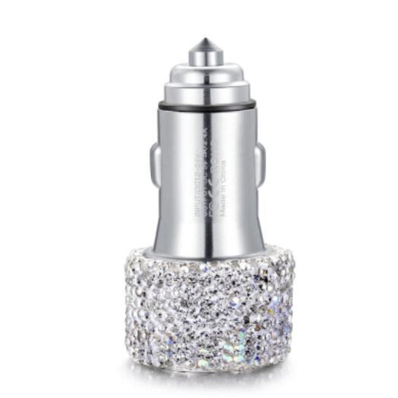 Silver car charger with gemstone embellishments on a white background
