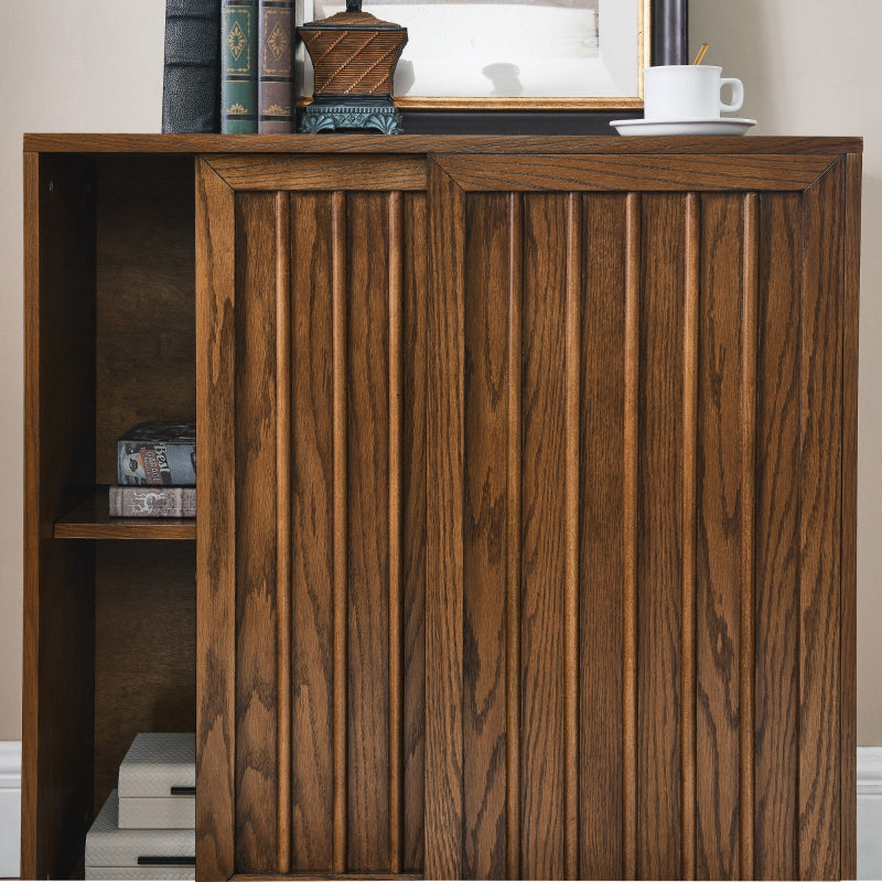 Wooden bookshelf with decorative items on a neutral background