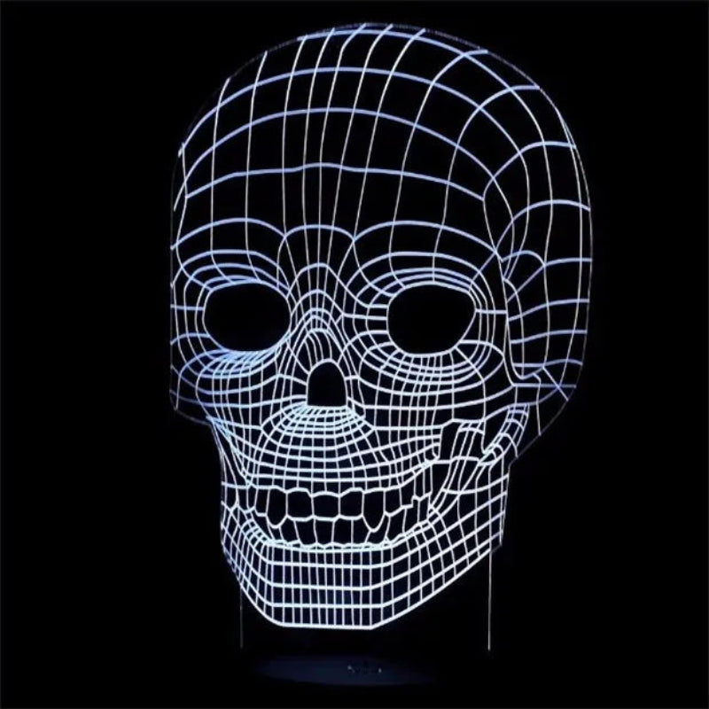 A 3D optical illusion LED lamp shaped like a human skull, glowing with white wireframe lines against a solid black background.