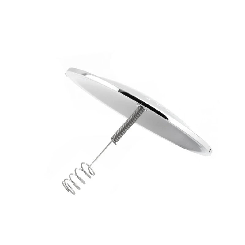 Metallic kitchen whisk on a white background