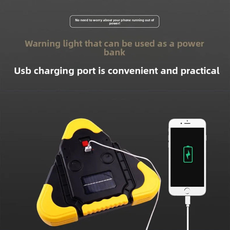 Yellow and black device with USB charging port and smartphone illustration on a dark background