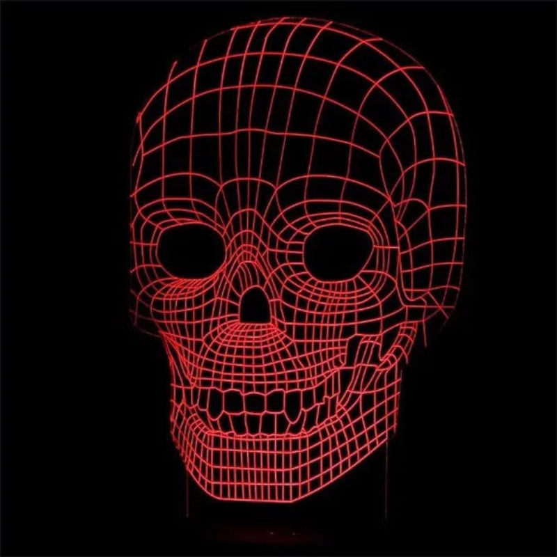 A glowing red wireframe skull lamp on a solid black background.