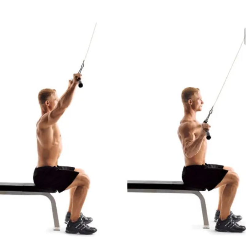 Man performing cable row exercise on a white background
