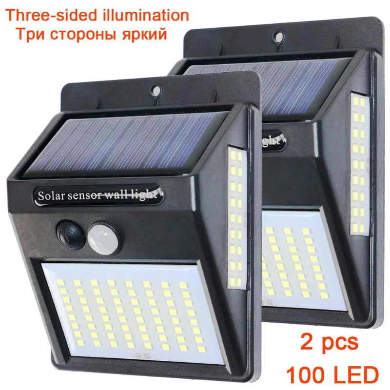 Two solar sensor wall lights with 100 LED lights each on a white background.