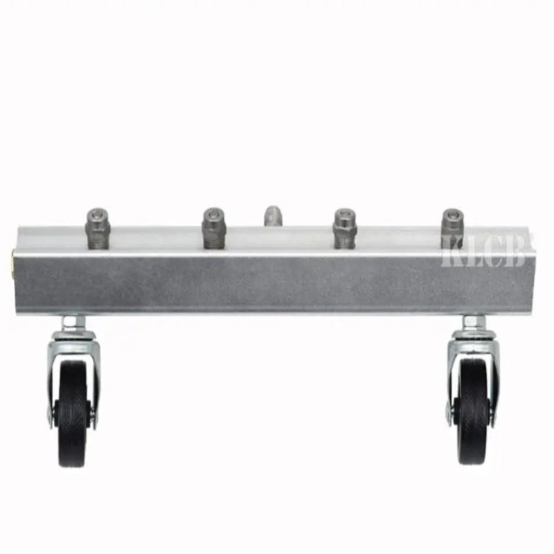 Metal component with wheels on a white background