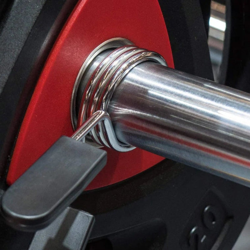 Set of metal measuring tools including weights and a tool with a keychain attachment.
