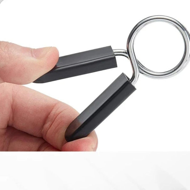 Set of metal measuring tools including weights and a tool with a keychain attachment.