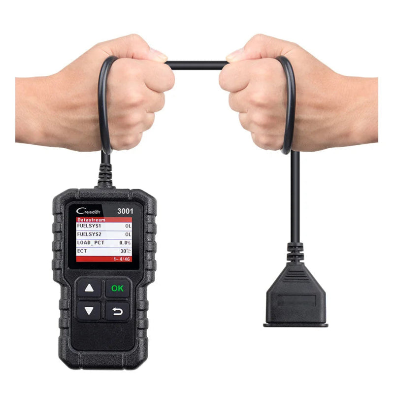 Car diagnostic tool with cables held by two hands on a white background
