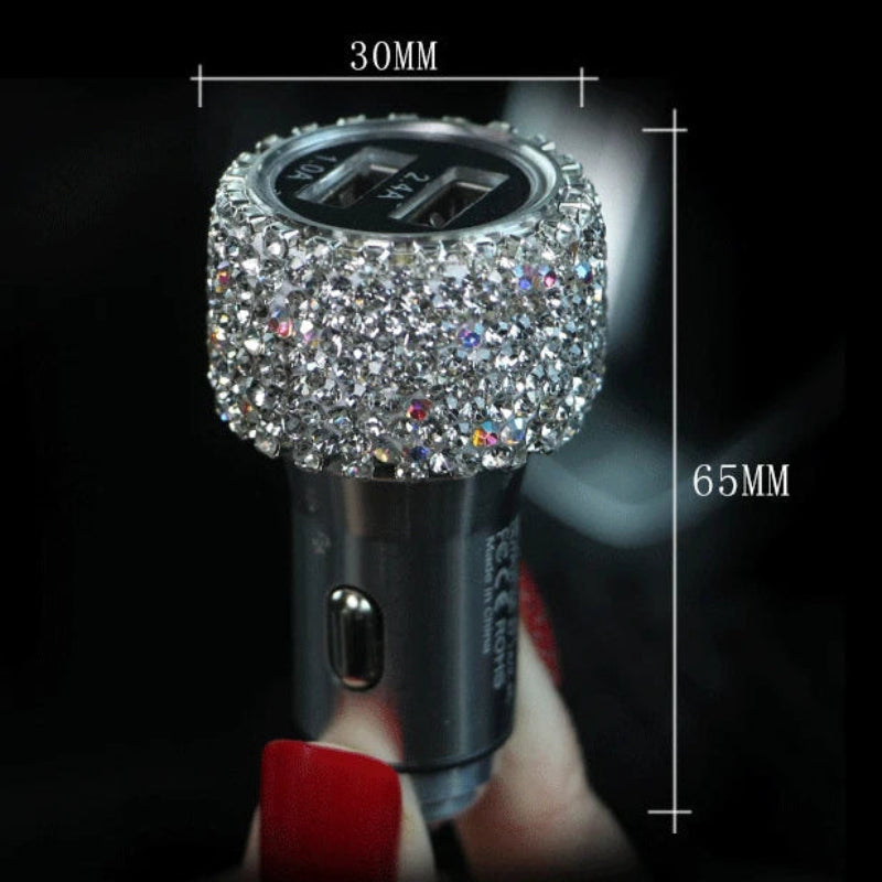 Decorative car charger with crystal embellishments and measurements on a black background