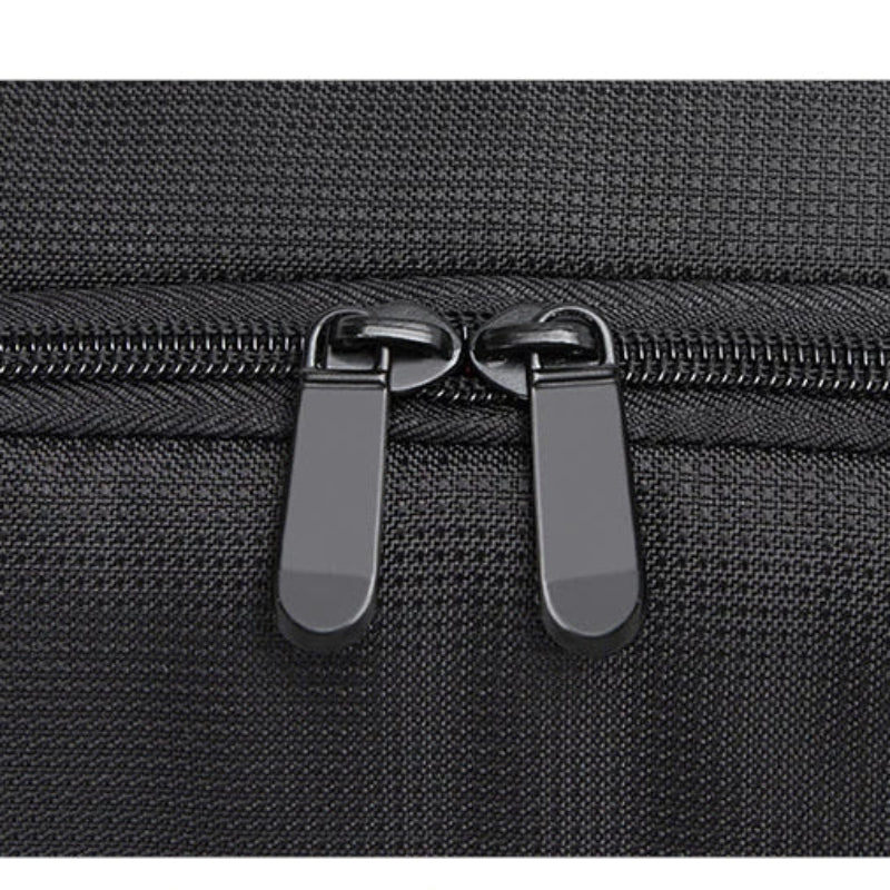 Close-up of a black zipper on a black bag