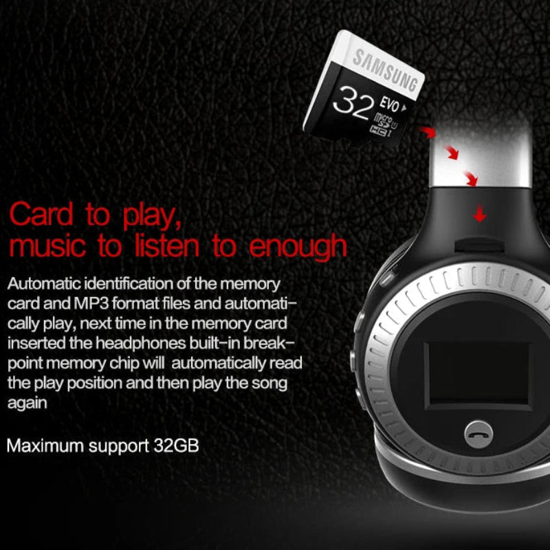 Black and silver headphones with a Samsung memory card on a dark background