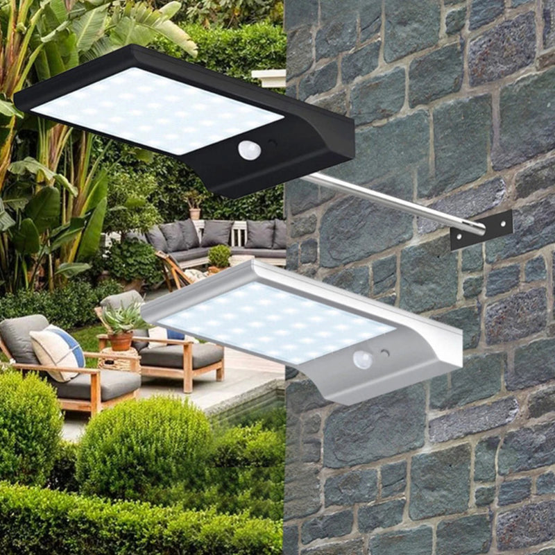 Solar-powered outdoor wall lights in garden and on stone wall