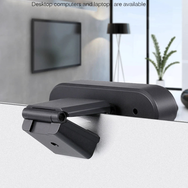 Black adjustable bracket with text on a blurred indoor background
