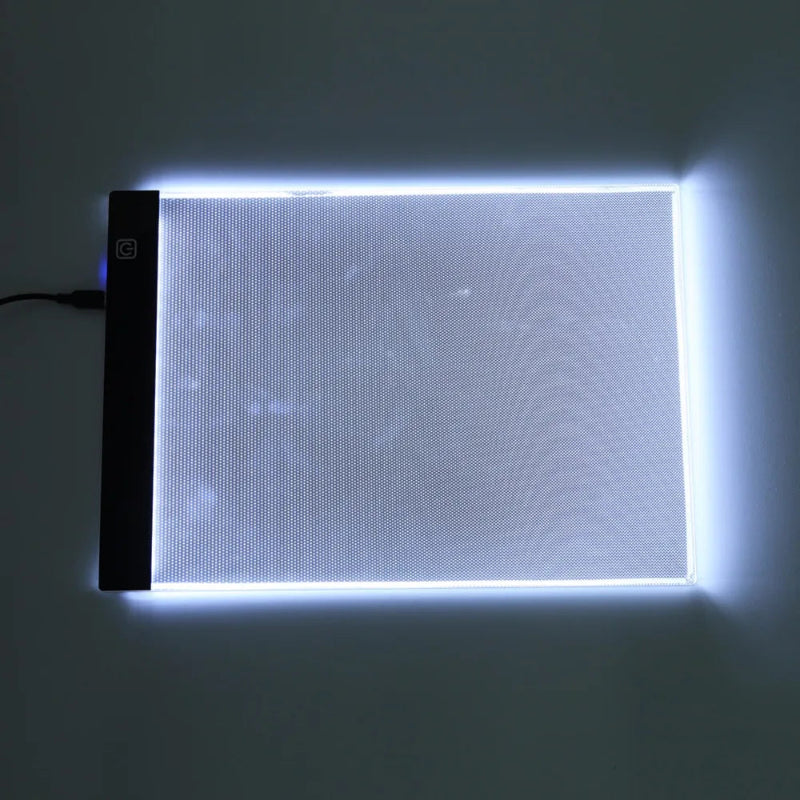 Light pad with glowing edge on a dark background